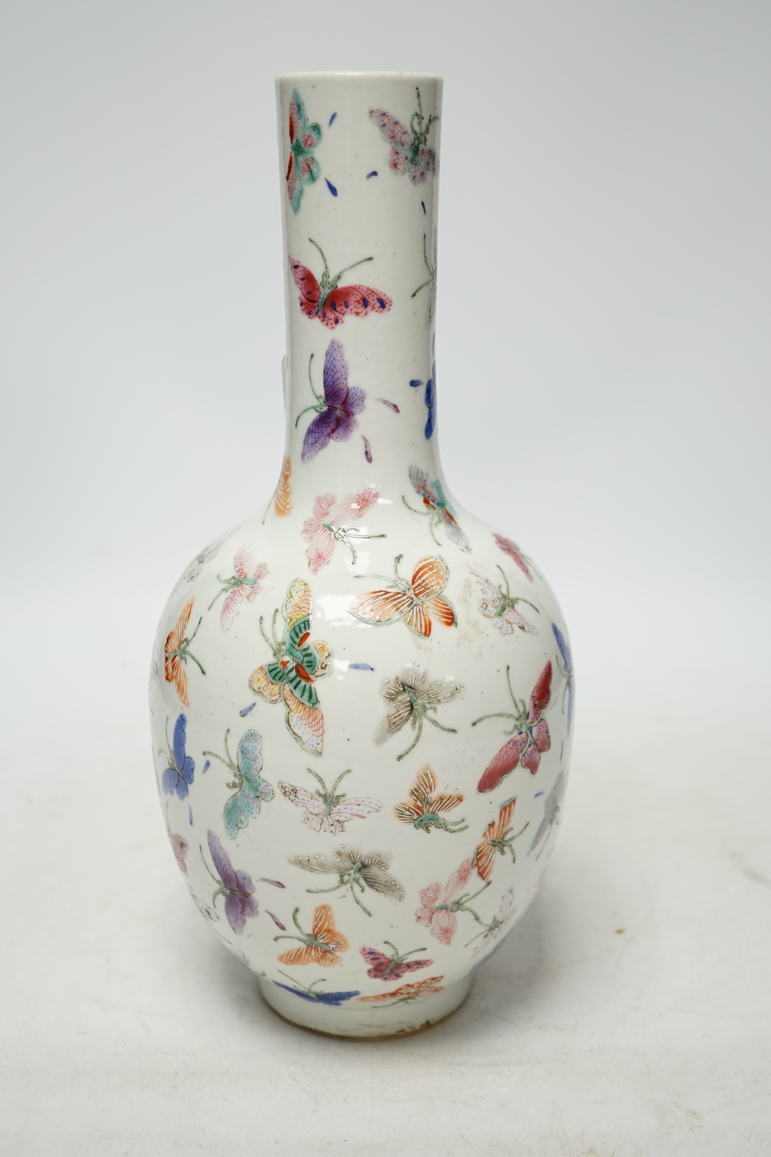 A Chinese famille rose ‘butterflies’ vase, 29cm high. Condition - good, light scratches to footrim, otherwise good. Guangxu marks